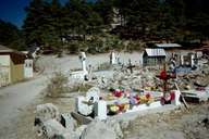 The cemetery of Creel, where carved marble graves neighbor graves of piled stones.